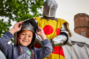 Boy and a knight at Kenilworth Castle in Warwickshire